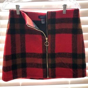 Plaid skirt with zip up front.